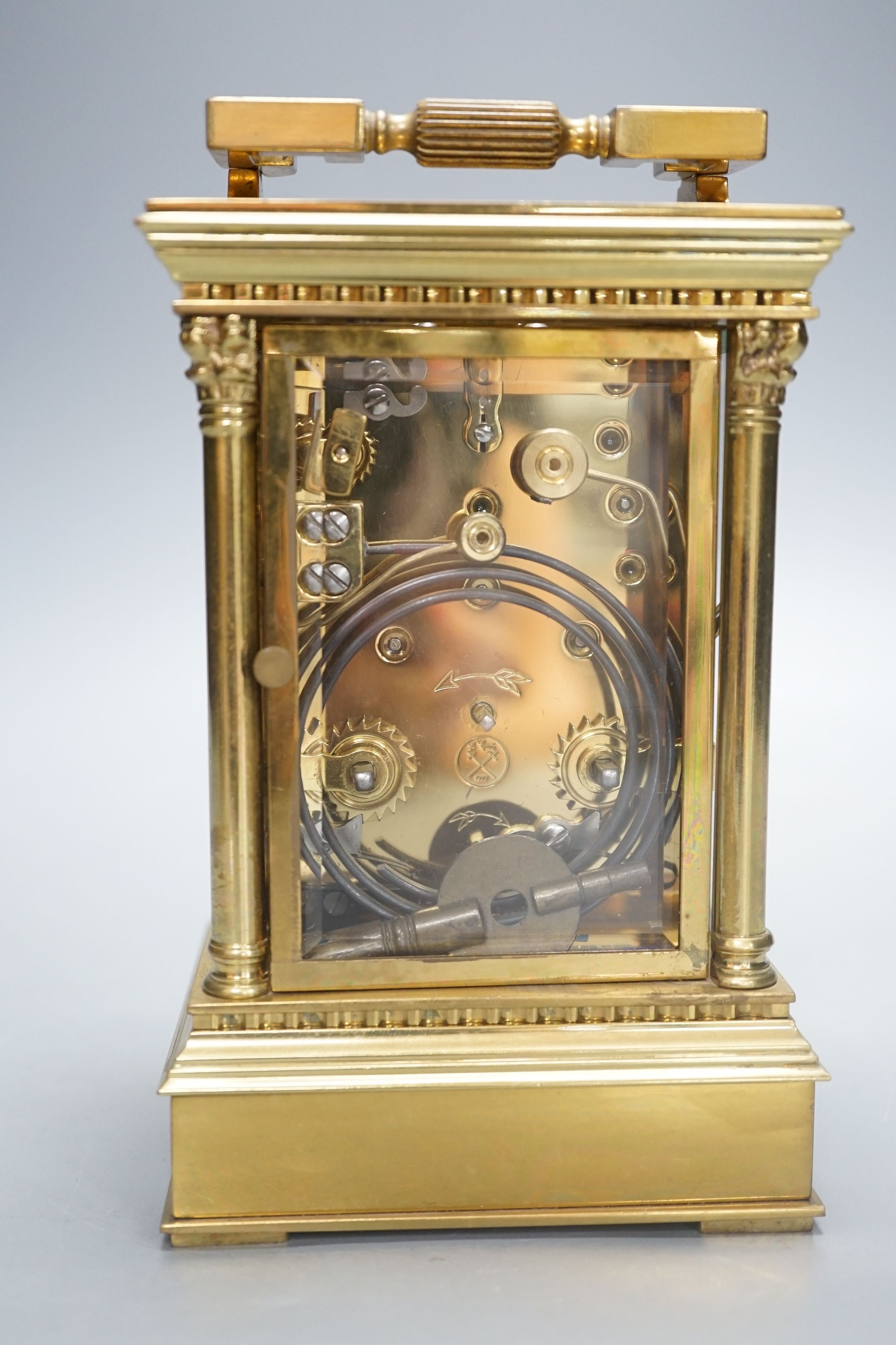 A large late 19th century brass carriage clock with alarm, and push repeat, 15 cms high.